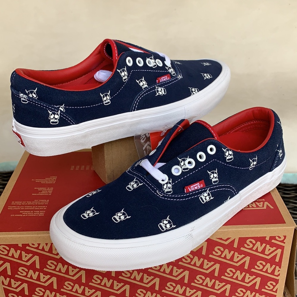 Vans Navy Canvas Sneakers with Red Lining and White Sole